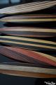 Rattleback Anagyre en bois artisanal fabrique France sculpteur sur bois sciences achat jeux cadeau noel original Toupie-Shop.com