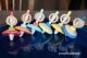 Comment jouer avec une toupie ficelle cadeau enfant couleur pastel acheter jeux toupies jouets traditionnels