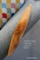 Anagyre en bois loupe if jeux sientifiques artisanat achat cadeau fabrique france rattleback toupie tourne dans un sens
