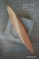 cadeau original surprenant toupie tourne que dans un sens jeux bois prunier fabrication francaise artisanale anagyre rattleback