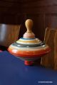toupie vintage cirque jouet ancien metal fer blanc poignee bois jeux retro acheter cadeau deco enfant collection Toupie Shop