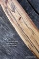  	Grand duc objet insolite jeux bois orme echauffe acheter anagyre rattleback toupie artisanale cadeau unique