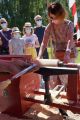 Tour a Velo Festival des Toupies du Monde 2021 animation grands jeux exposition fabrication toupie jouet en bois